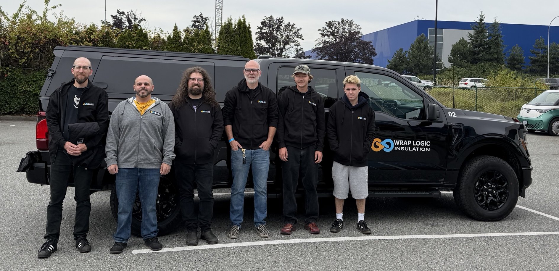 The Wrap Logic crew with a company truck