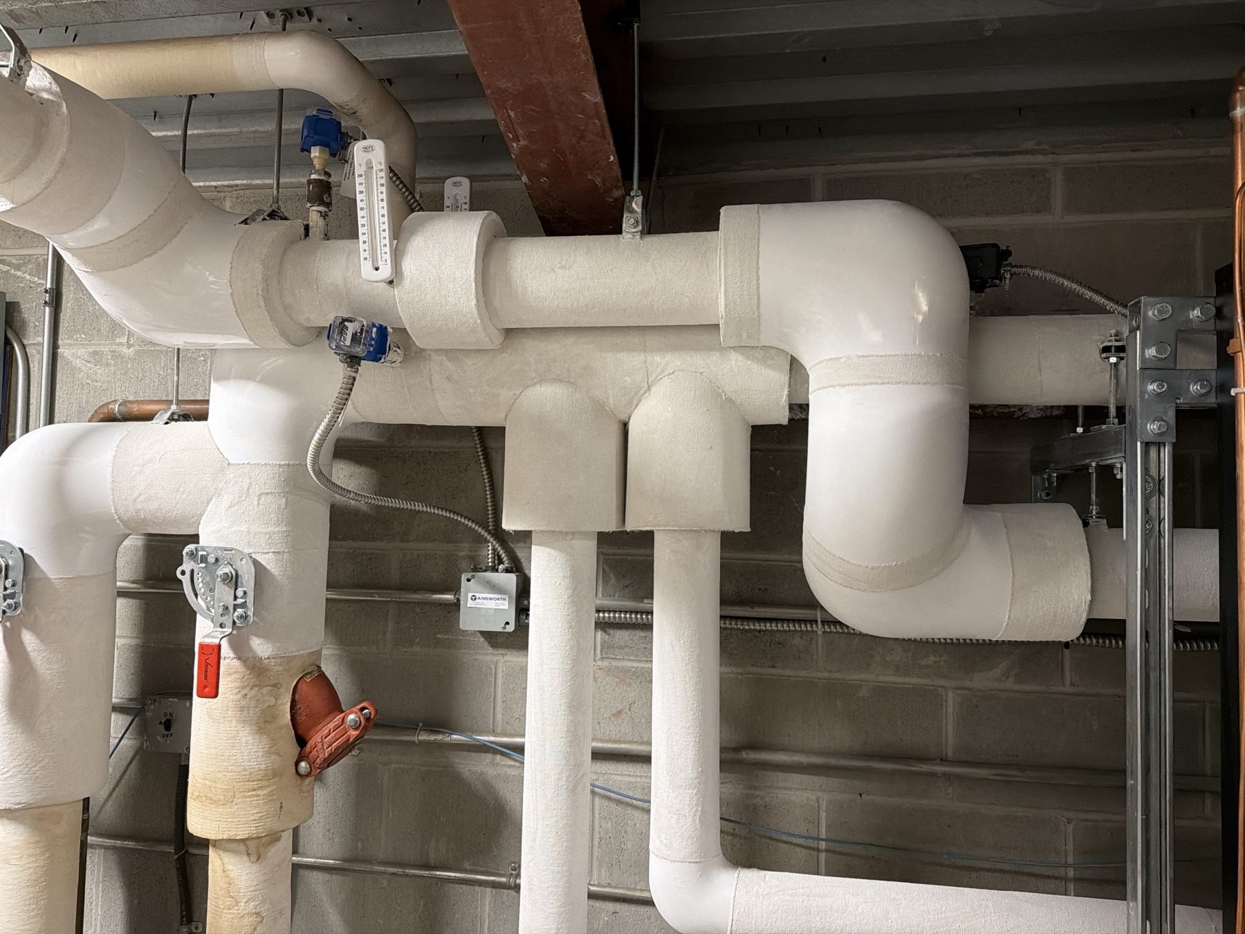 Insulated piping and fittings